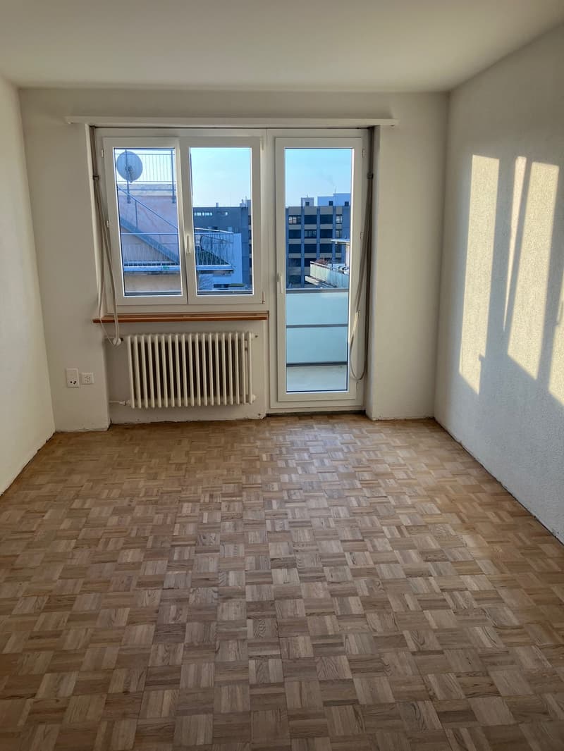 empty room, wooden floor, large windows, balcony