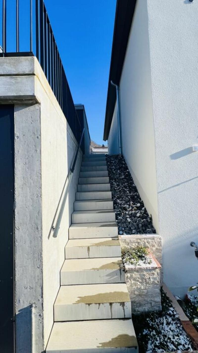 Modernes 5.5-Zimmer-Neubau-Einfamilienhaus mit 2 Bädern, Carport, Parkplatz & Garten in Duggingen (21)