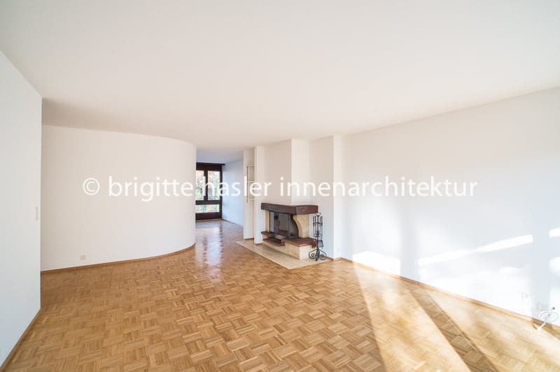 Empty room, white walls, wooden floor, fireplace