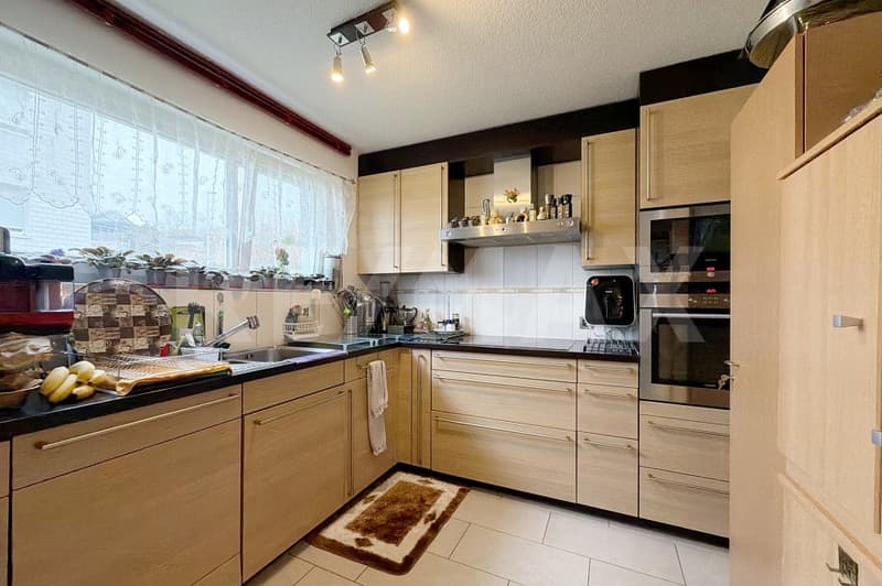 Appartement lumineux 4.5 pièces avec balcon et espace de séjour (5)