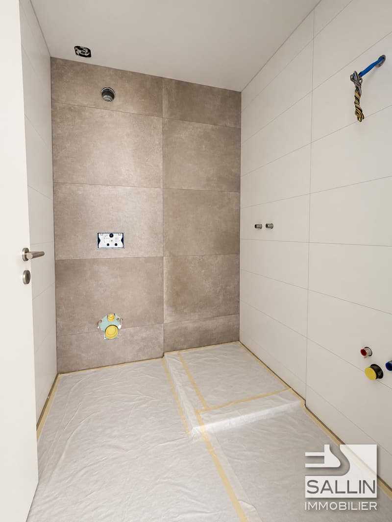 Appartement neuf de 3½ pièces, avec parking, au centre ville (8)
