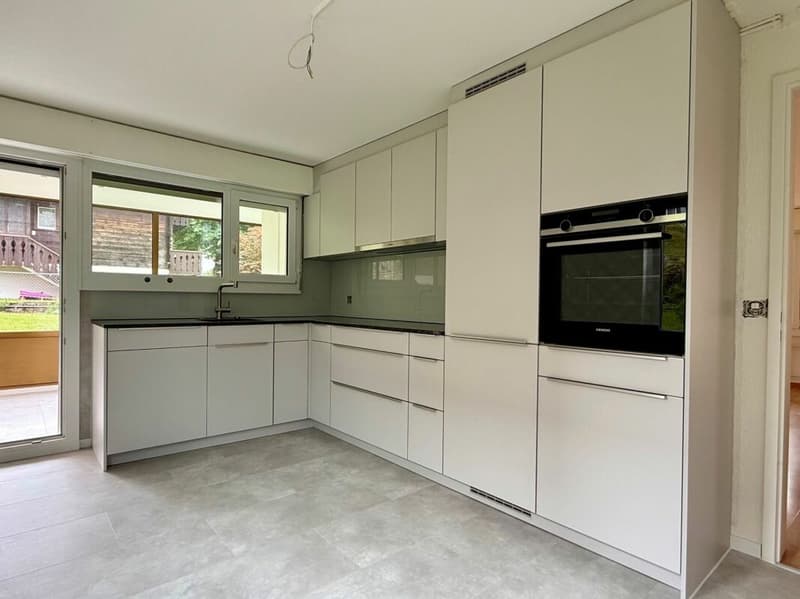 5.5-Zimmer-Parterrewohnung mit Wintergarten und Landanteil (3)