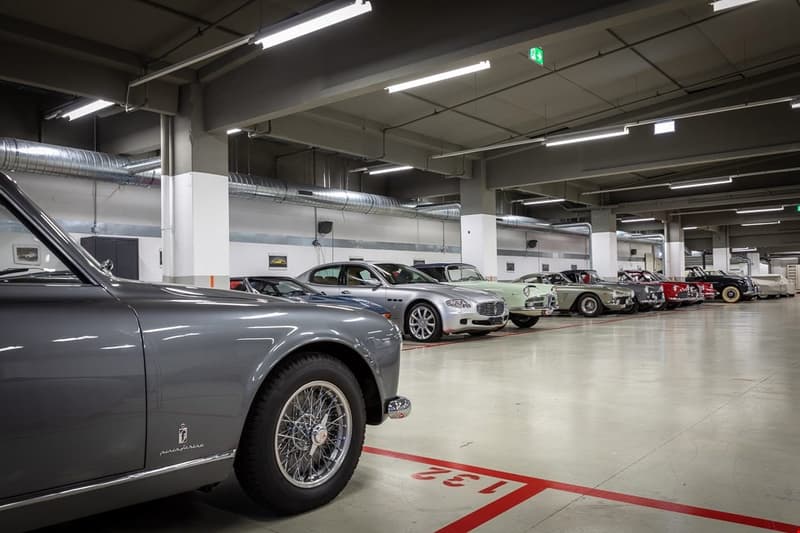 Underground parking lot, with several classic cars parked in it