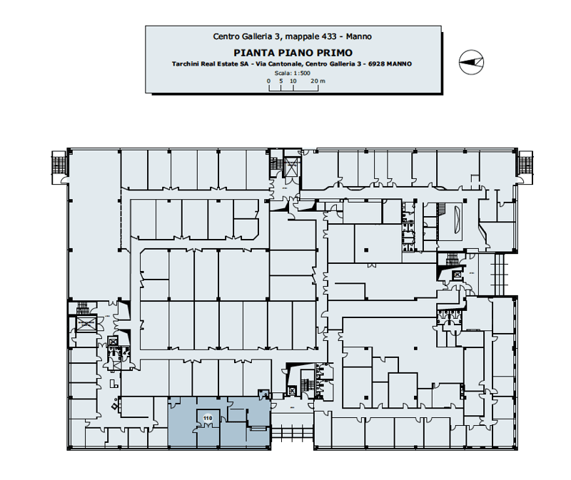 Floor plan of a building with multiple rooms, including a large central room, smaller rooms around it, and a room labeled '110'.