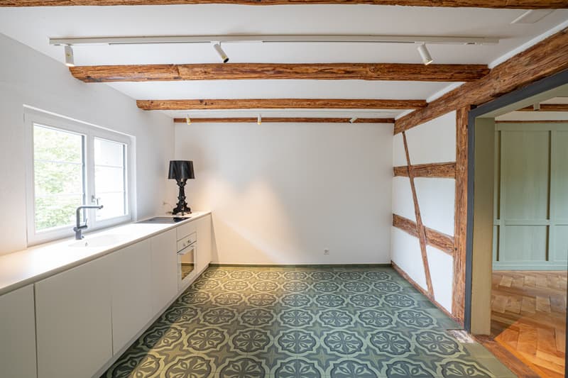 kitchen, wooden beams, window, floor tiles, kitchen counter, oven, lamp, sink