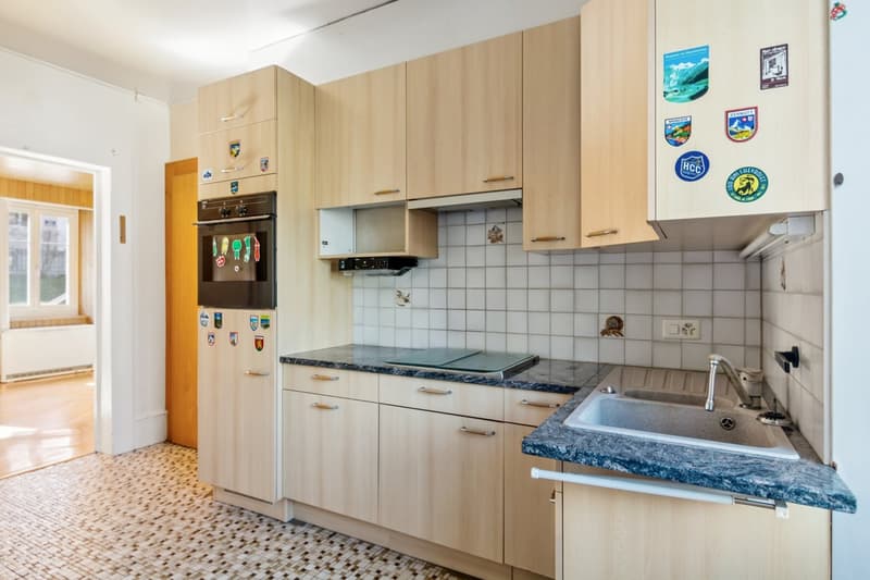 Maison mitoyenne avec joli potentiel de rénovation (2)