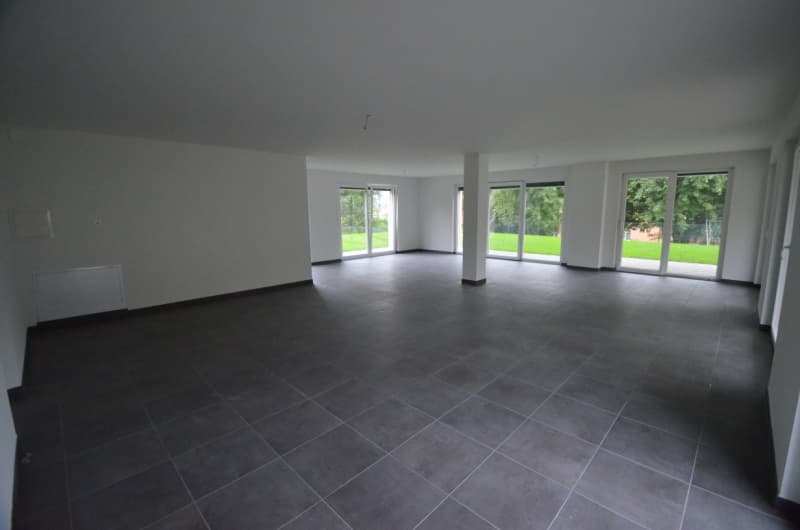 Empty room, sliding glass doors, white tiles, white walls
