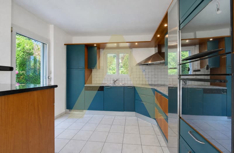 EPALINGES - UNE MAISON FAMILIALE AU COEUR DE LA VERDURE (5)