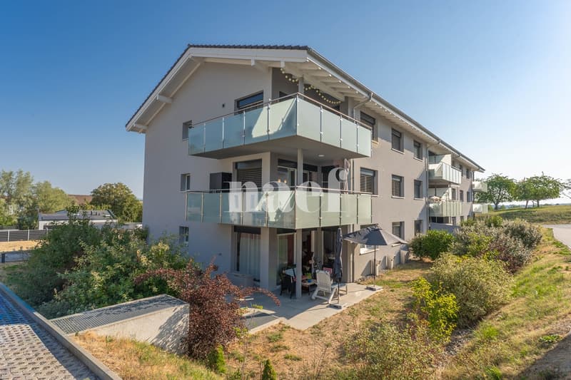 Appartement de 4.5 pièces au rez-de-chaussée avec terrasse et jardin à vendre à Prez-vers-Noréaz (1)