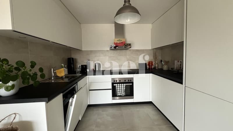 Spacieux appartement de 2,5 pièces au rez à Bussy (3)