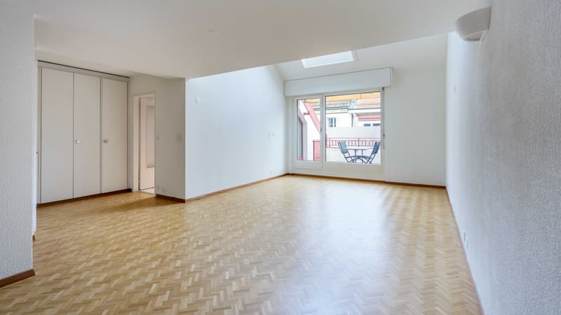 Séjour avec accès au balcon orienté Est