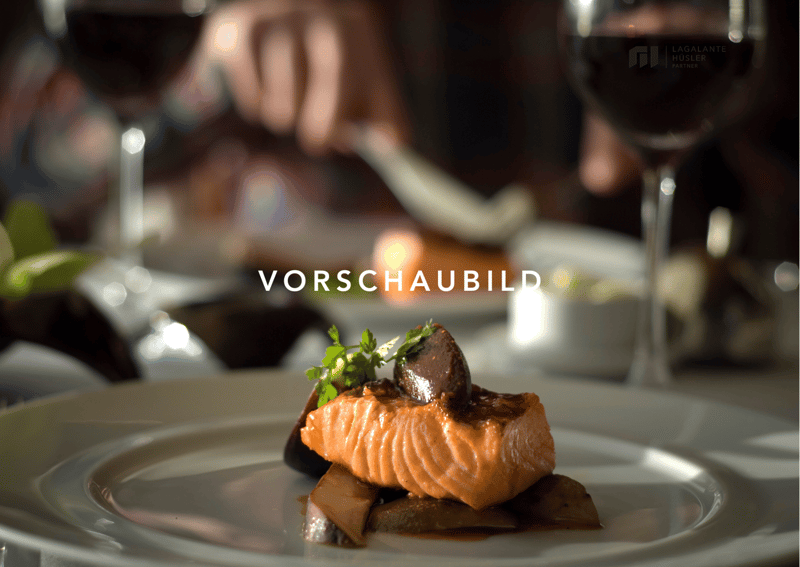 A plate of salmon with vegetables and a garnish of herbs