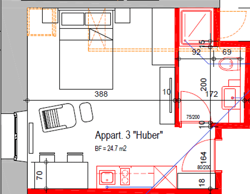 Floor plan showing kitchen, dining area, bedroom, bathroom, balcony