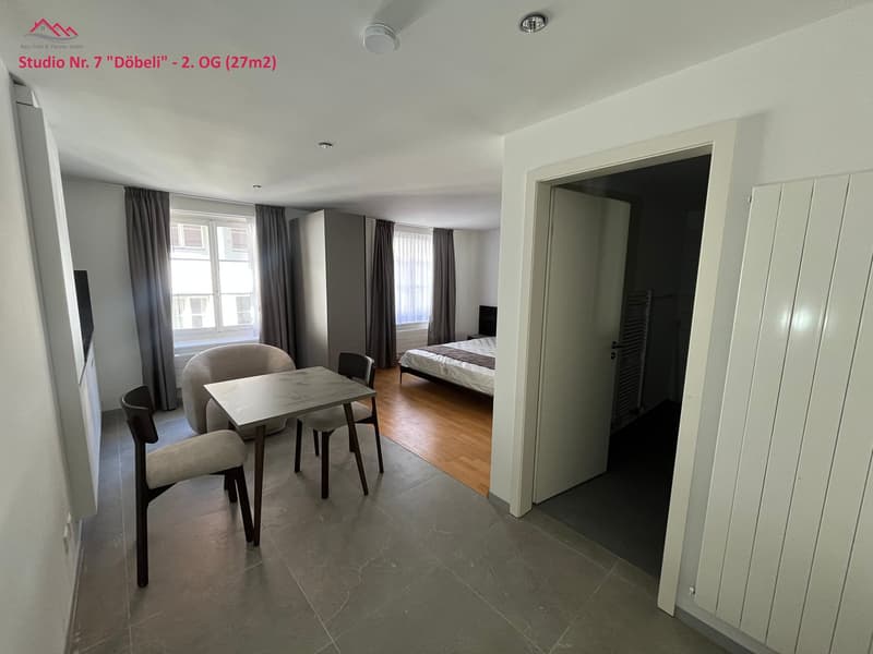 minimalist interior design, modern furniture, table with chairs, bed with bedding, double windows, wooden floor