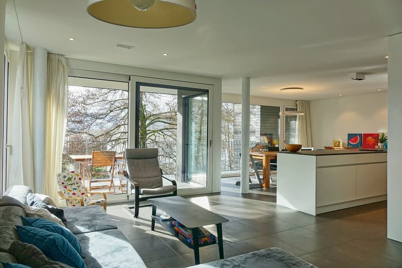 large windows, balcony, table and chairs on balcony, modern furnishings