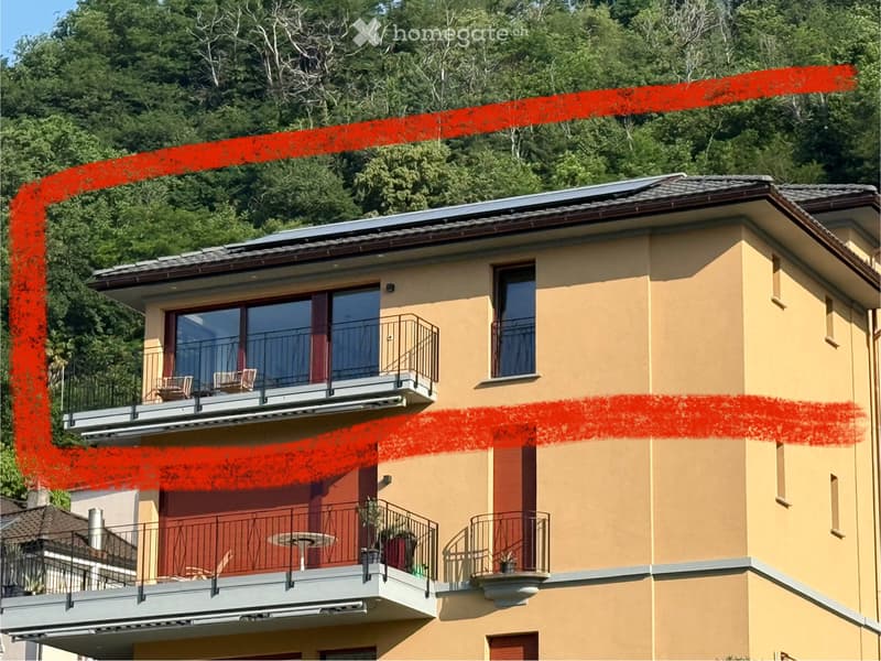 Appartamento con ampia terrazza-tetto (2)