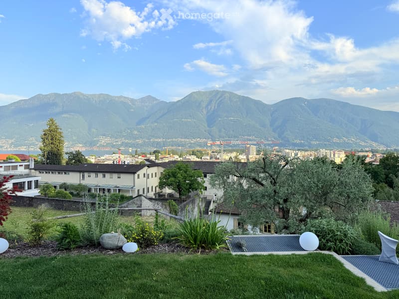 Appartamento con ampia terrazza-tetto (3)