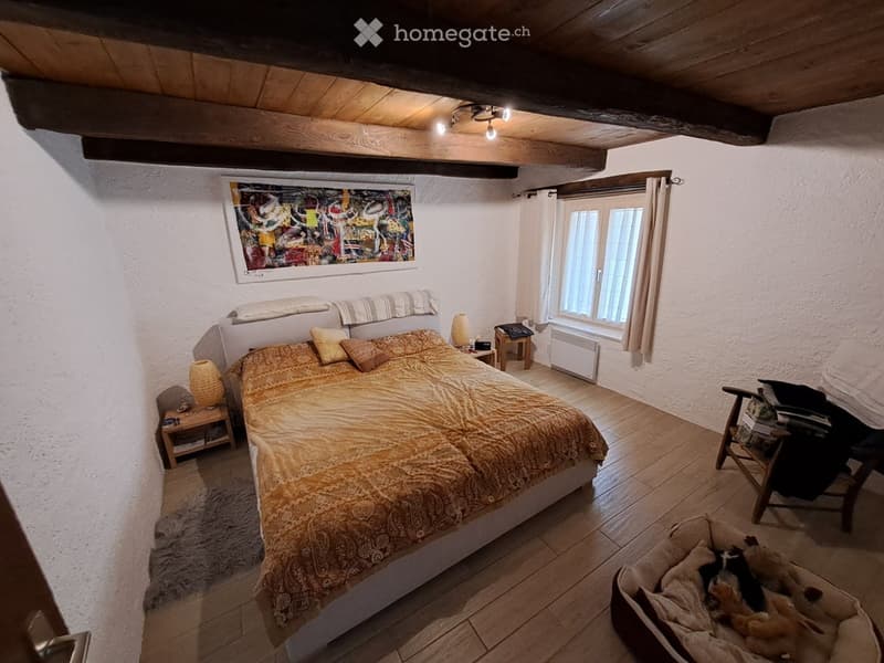 Casa 4.5 locali con travi a vista e camino a Miglieglia (5)
