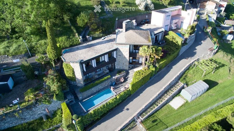 Elegante Villa Unifamiliare a Brè con Piscina e Vista (5)