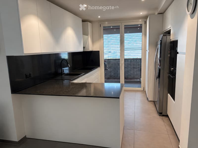 Moderno appartamento di 4.5 Giubiasco con giardino (2)