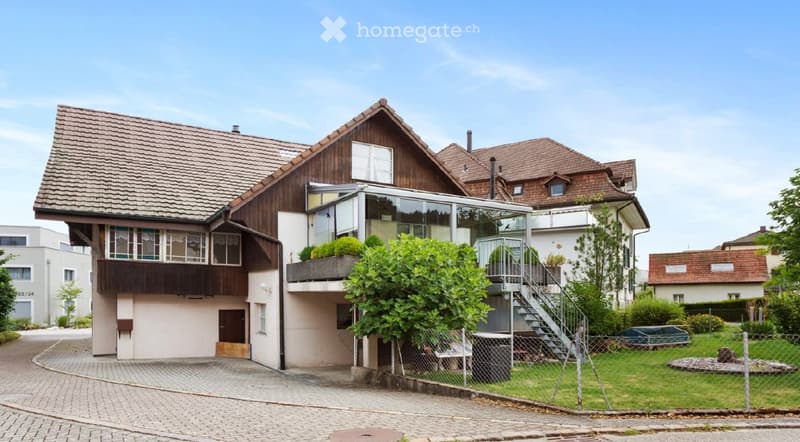6.5-Zimmer-Wohnung mit Wintergarten, Garten & viel Platz (1)