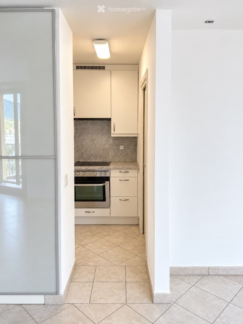 2.5 locali con balcone e vista lago nel cuore di Bissone (5)