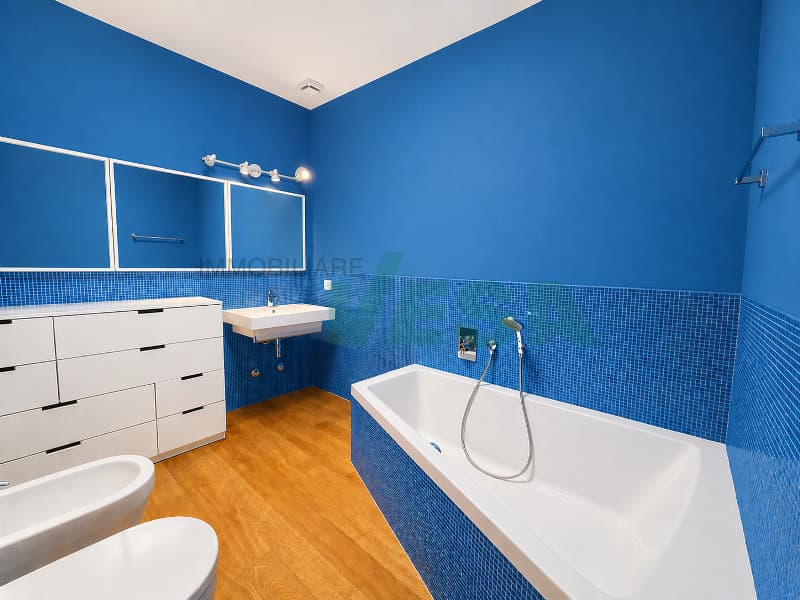Elegante appartamento 5,5 locali con bella vista e giardino privato (13)