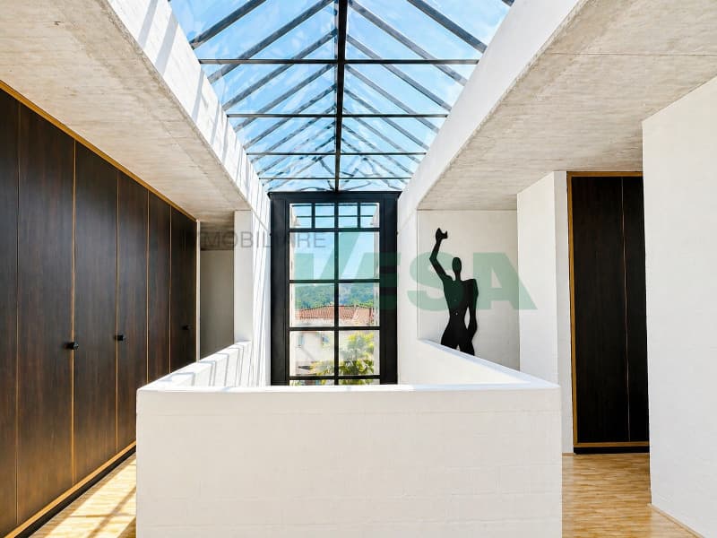 Iconica villa "Casa Rotonda" firmata Mario Botta con bel giardino (4)
