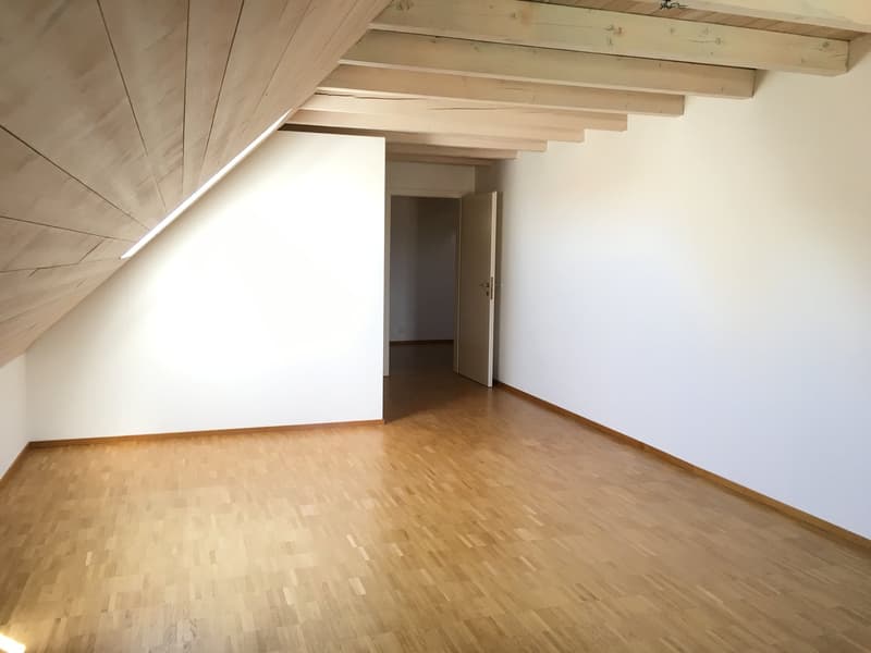 empty room, wooden floor, white walls, wooden ceiling, open door