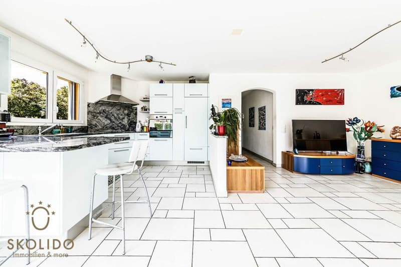 Edificio residenziale con tre appartamenti vacanza e giardino ad Ascona (9)