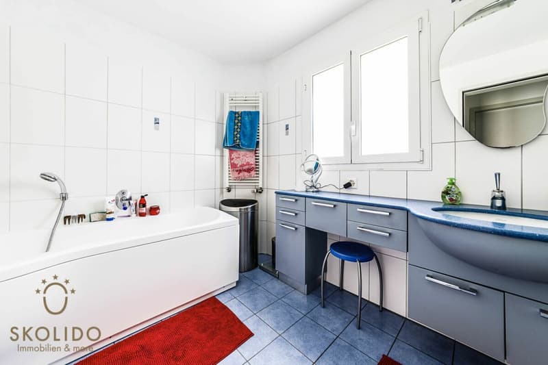 Edificio residenziale con tre appartamenti vacanza e giardino ad Ascona (11)