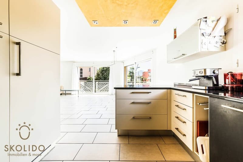 Edificio residenziale con tre appartamenti vacanza e giardino ad Ascona (27)