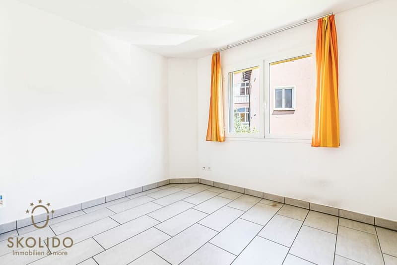 Edificio residenziale con tre appartamenti vacanza e giardino ad Ascona (35)