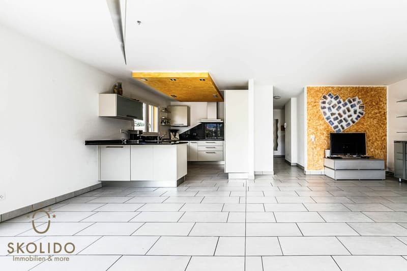 Edificio residenziale con tre appartamenti vacanza e giardino ad Ascona (24)