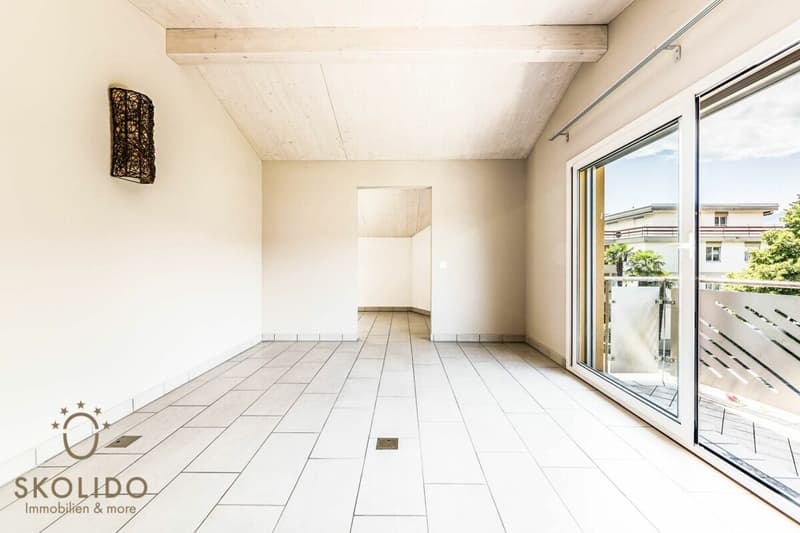 Edificio residenziale con tre appartamenti vacanza e giardino ad Ascona (41)