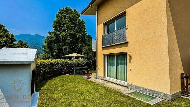 Edificio residenziale con tre appartamenti vacanza e giardino ad Ascona (15)