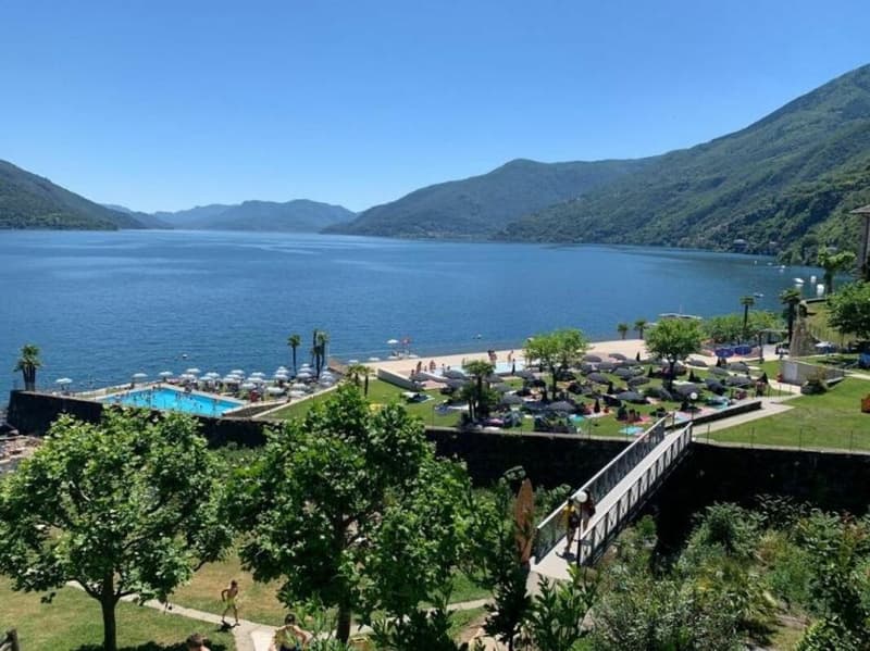 Edificio residenziale con tre appartamenti vacanza e giardino ad Ascona (70)