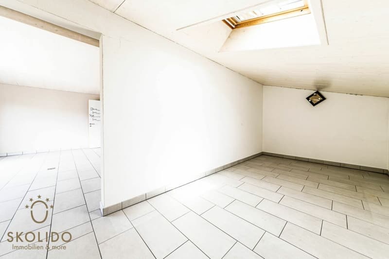Edificio residenziale con tre appartamenti vacanza e giardino ad Ascona (42)