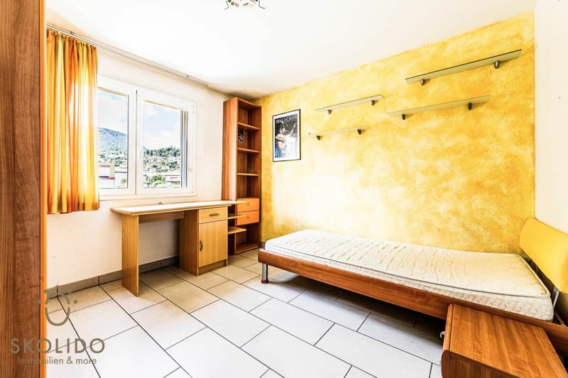 Edificio residenziale con tre appartamenti vacanza e giardino ad Ascona (34)