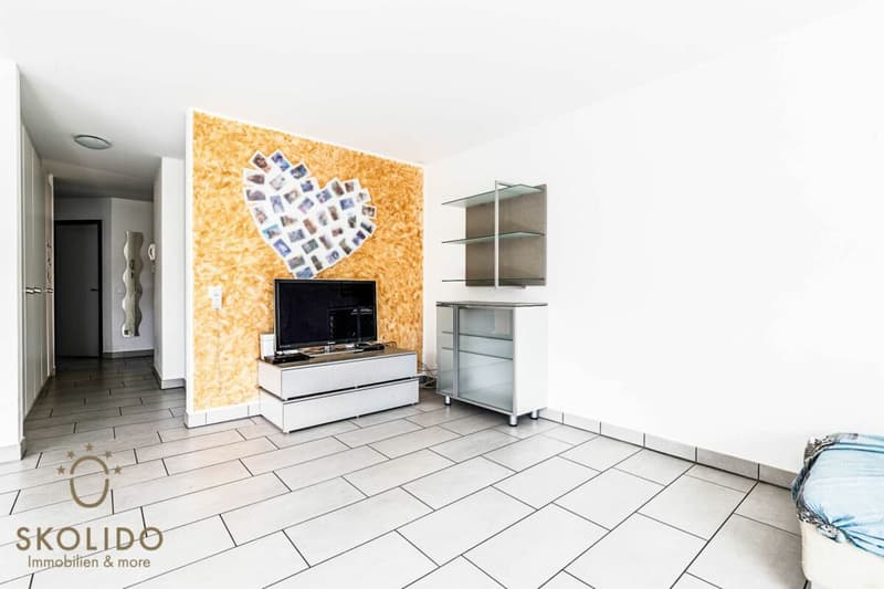 Edificio residenziale con tre appartamenti vacanza e giardino ad Ascona (22)