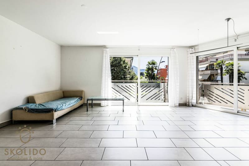 Edificio residenziale con tre appartamenti vacanza e giardino ad Ascona (21)