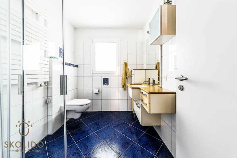 Edificio residenziale con tre appartamenti vacanza e giardino ad Ascona (30)