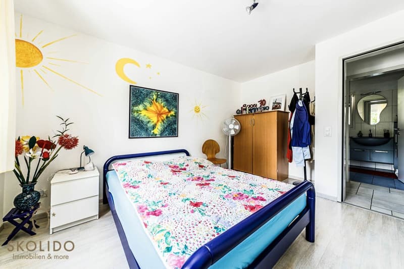 Edificio residenziale con tre appartamenti vacanza e giardino ad Ascona (12)