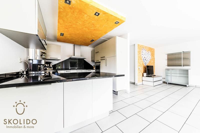 Edificio residenziale con tre appartamenti vacanza e giardino ad Ascona (26)
