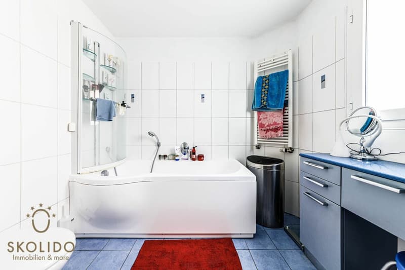 Edificio residenziale con tre appartamenti vacanza e giardino ad Ascona (10)