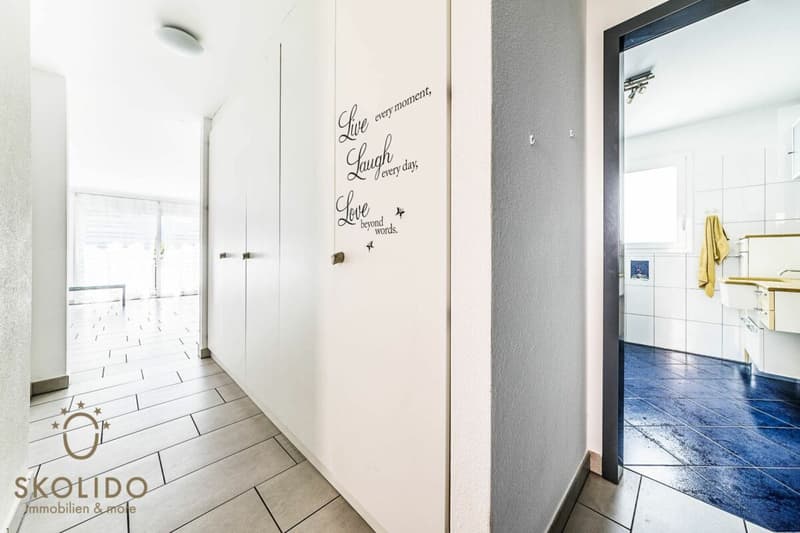 Edificio residenziale con tre appartamenti vacanza e giardino ad Ascona (28)