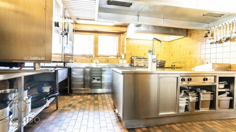 Village shop, large restaurant with terrace, duplex apartment, garages, and building land in the heart of Mund (12)
