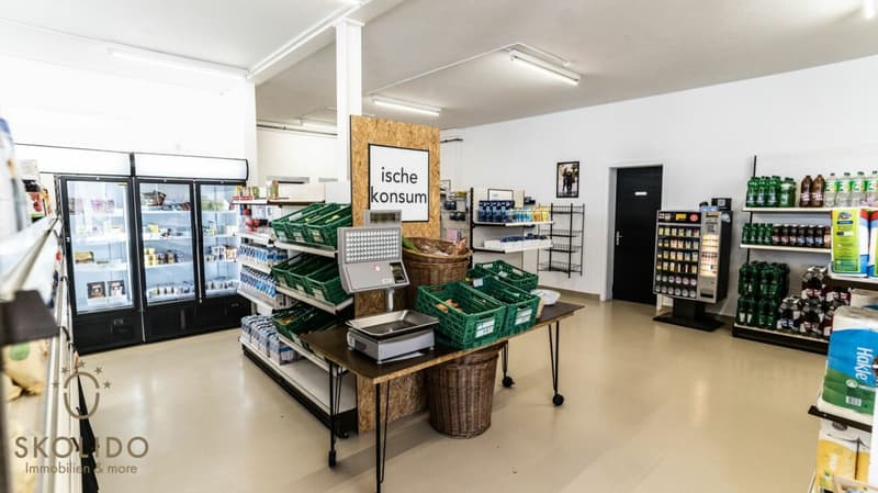 Village shop, large restaurant with terrace, duplex apartment, garages, and building land in the heart of Mund (27)