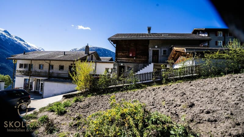 Village shop, large restaurant with terrace, duplex apartment, garages, and building land in the heart of Mund (21)