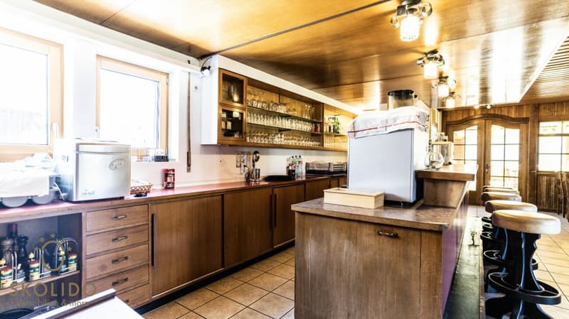 Village shop, large restaurant with terrace, duplex apartment, garages, and building land in the heart of Mund (4)